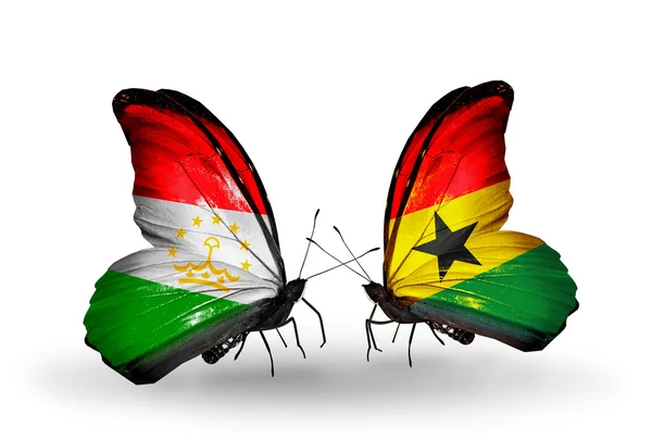 Papillons avec drapeaux du Tadjikistan et du Ghana — Photo