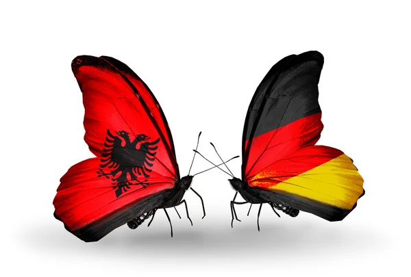 Farfalle con bandiere Albania e Germania — Foto Stock