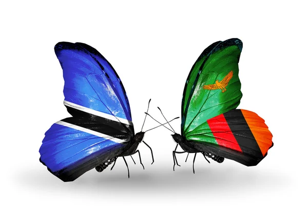 Butterflies with Botswana and Zambia flags — Stock Photo, Image