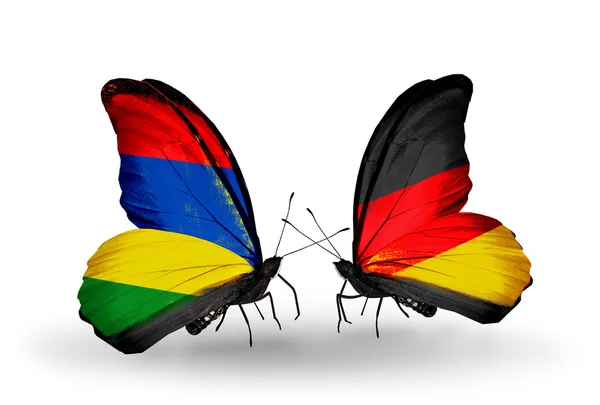 Butterflies with  Mauritius and Germany flags — Stock Photo, Image