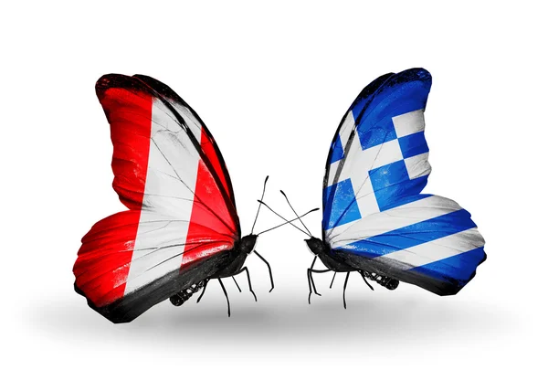 Бабочки с флагами Перу и Греции — стоковое фото