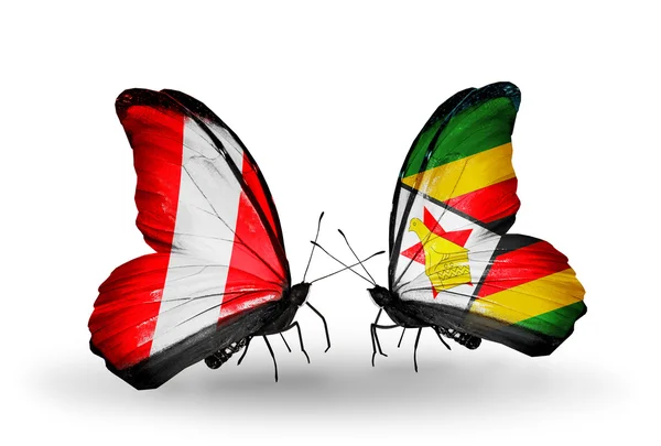 Peru ve Zimbabve bayrağı ile kelebekler — Stok fotoğraf