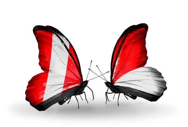 페루와 모나코, 인도네시아 국기와 나비 — 스톡 사진