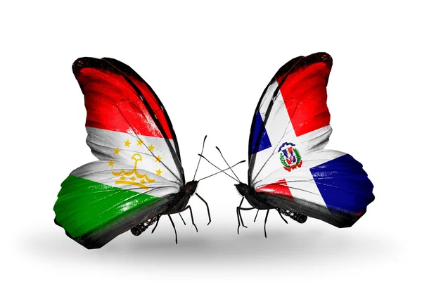 Butterflies with Tajikistan and Dominicana flags — Stock Photo, Image