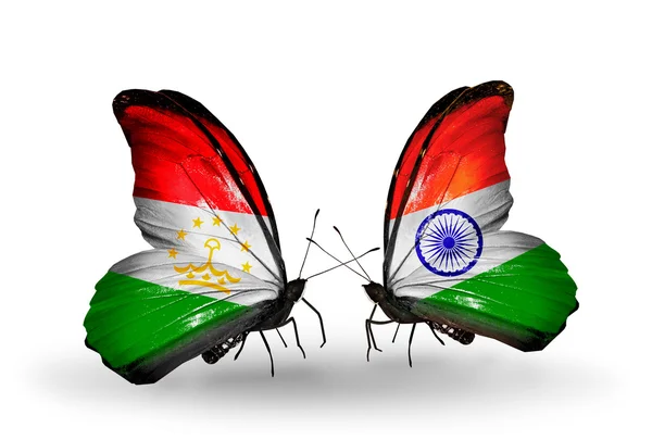 Butterflies with Tajikistan and  India flags — Stock Photo, Image