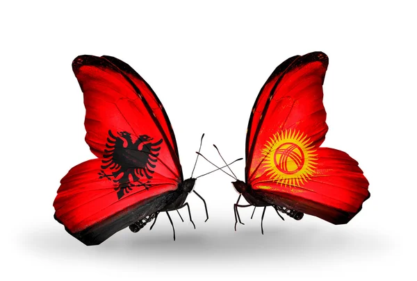 Butterflies with Albania and  Kirghiz flags — Stock Photo, Image