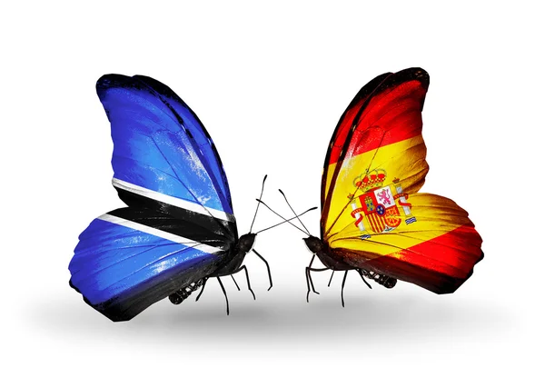 Mariposas con banderas de Botswana y España —  Fotos de Stock