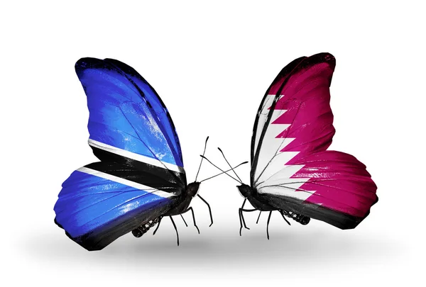 Mariposas con banderas de Botswana y Qatar —  Fotos de Stock