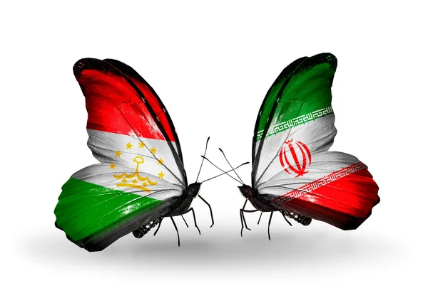 Butterflies with Tajikistan and  Iran flags — Stock Photo, Image