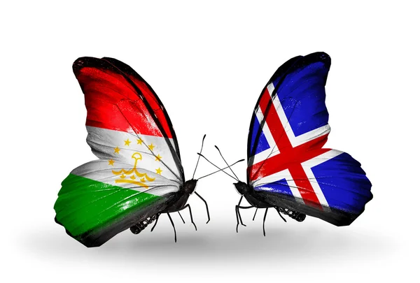 Papillons avec drapeaux du Tadjikistan et de l'Islande — Photo