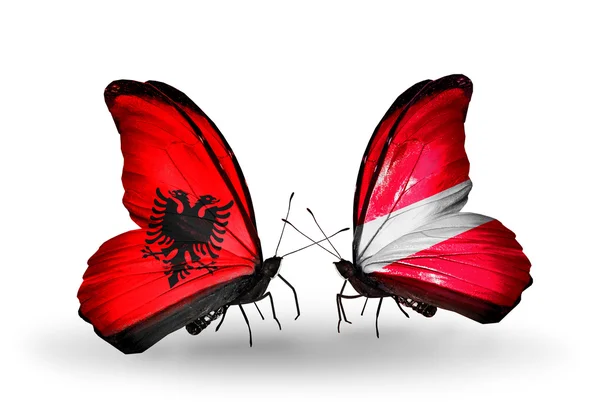 Mariposas con banderas de Albania y Letonia —  Fotos de Stock