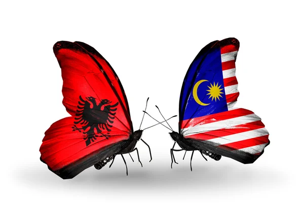 Butterflies with  Albania and Malaysia flags — Stock Photo, Image