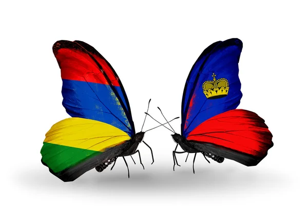 Farfalle con bandiere Mauritius e Liechtenstein — Foto Stock