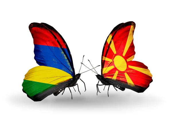 Mariposas con banderas de Mauricio y Macedonia — Foto de Stock