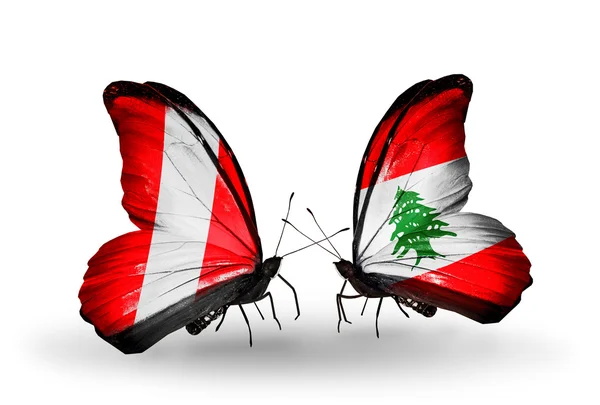 Butterflies with Peru and Lebanon  flags — Stock Photo, Image