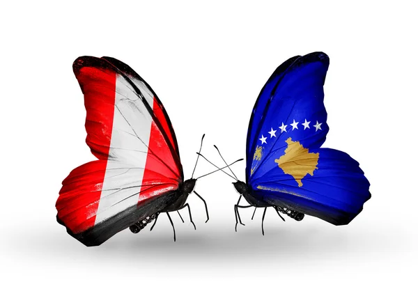 Butterflies with Peru and Kosovo flags — Stock Photo, Image