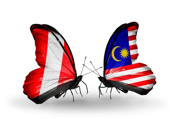Butterflies with Peru and Malaysia flags — Stock Photo, Image