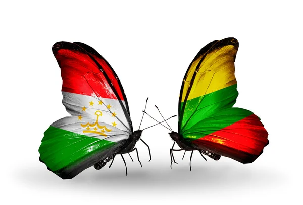 Butterflies with  Tajikistan and Lithuania flags — Stock Photo, Image