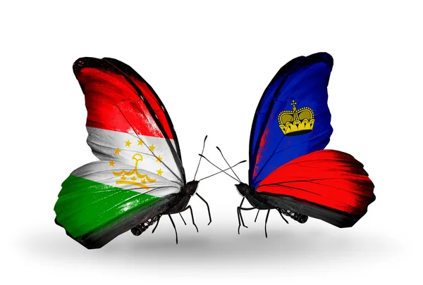 Butterflies with  Tajikistan and Liechtenstein flags — Stock Photo, Image