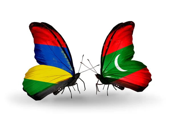 Mariposas con banderas de Mauricio y Maldivas — Foto de Stock