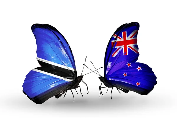 Butterflies with Botswana and New Zealand flags — Stock Photo, Image