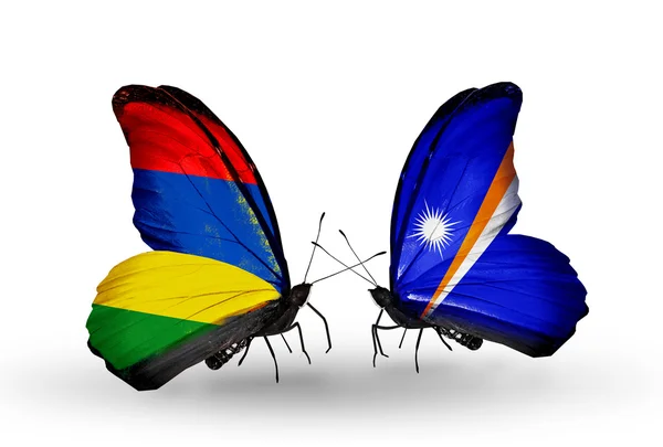 Butterflies with Mauritius and Marshall islands flags — Stock Photo, Image