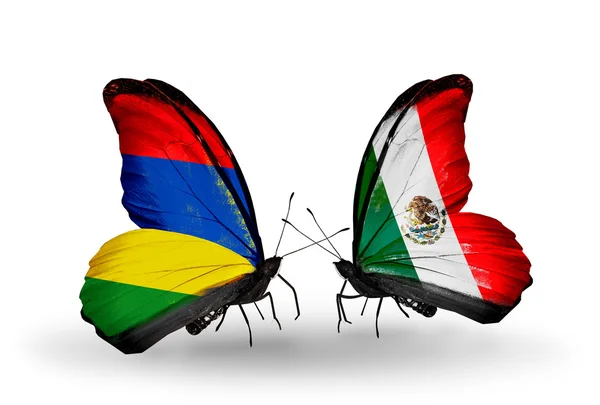 Papillons avec drapeaux Maurice et Mexique — Photo