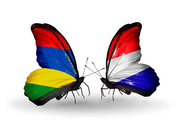 Butterflies with Mauritius and Holland flags — Stock Photo, Image