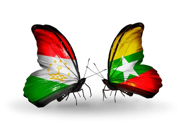 Motyle z Tadżykistanu i myanmar flagi — Zdjęcie stockowe