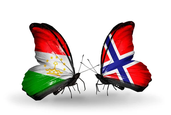 Butterflies with Tajikistan and Norway flags — Stock Photo, Image