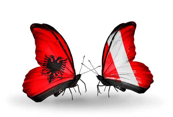 Borboletas com bandeiras da Albânia e do Peru — Fotografia de Stock