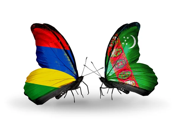 Butterflies with  Mauritius and Turkmenistan flags — Stock Photo, Image