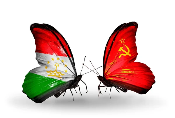 Schmetterlinge mit Tadschikistan und sowjetischen Gewerkschaftsfahnen — Stockfoto