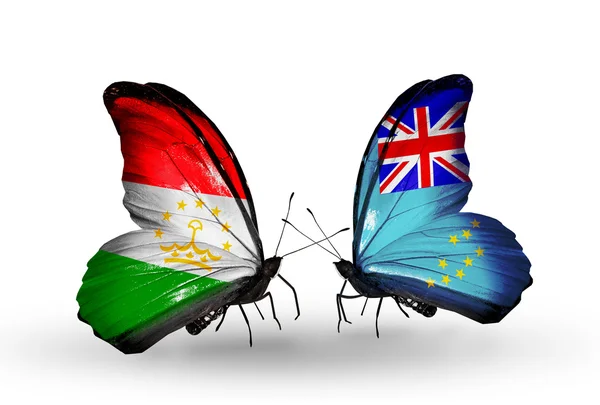 Butterflies with Tajikistan and Tuvalu flags — Stock Photo, Image