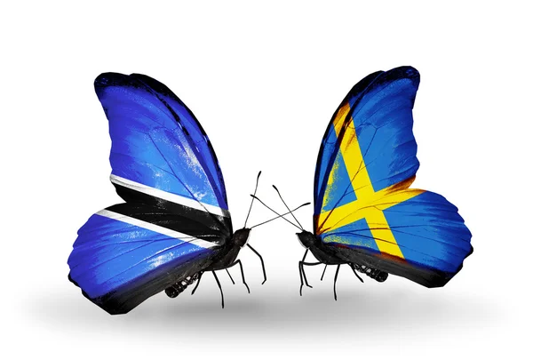 Butterflies with Botswana and Sweden flags — Stock Photo, Image