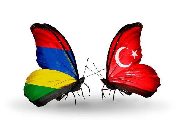Borboletas com bandeiras da Maurícia e da Turquia — Fotografia de Stock