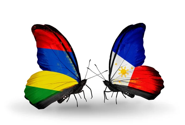 Butterflies with Mauritius and Philippines flags — Stock Photo, Image