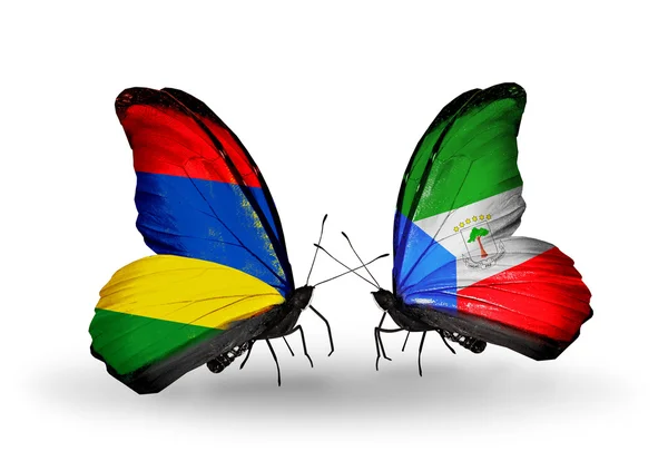 Бабочки с флагами Маврикия и Экваториальной Гвинеи — стоковое фото