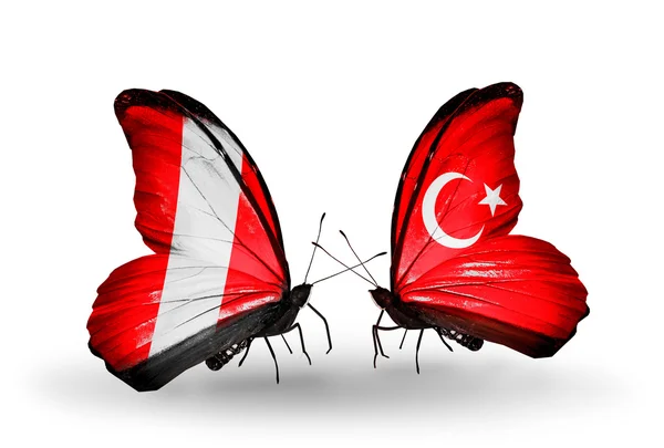 Butterflies with Peru and Turkey flags — Stock Photo, Image