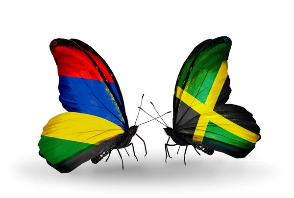 Butterflies with  Mauritius and Jamaica flags — Stock Photo, Image