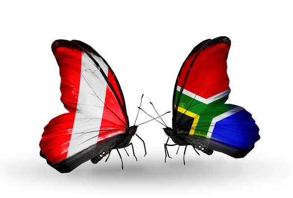 Butterflies with Peru and South Africa flags — Stock Photo, Image