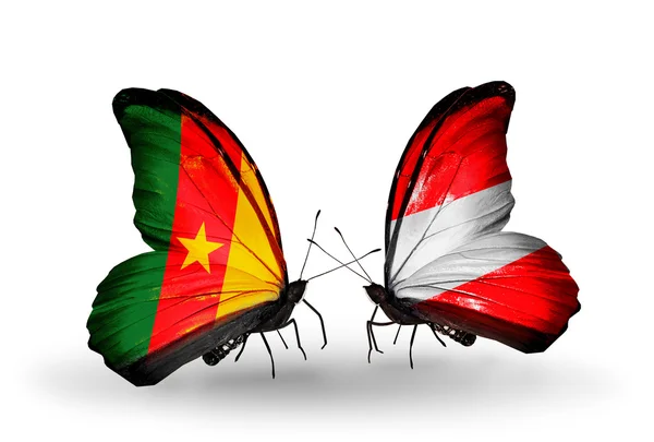 Butterflies with Cameroon and  Austria flags — Stock Photo, Image