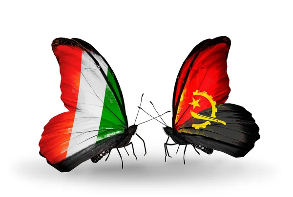 Butterflies with Cote Divoire and Angola flags — Stock Photo, Image