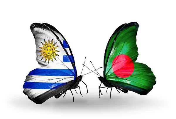 Farfalle con bandiere Uruguay e Bangladesh — Foto Stock