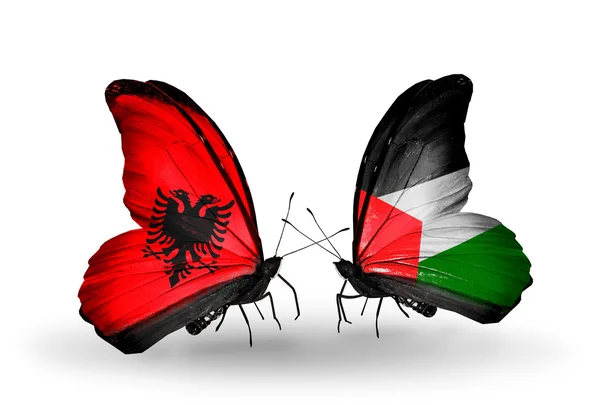 Butterflies with Albania and Palestine flags — Stock Photo, Image