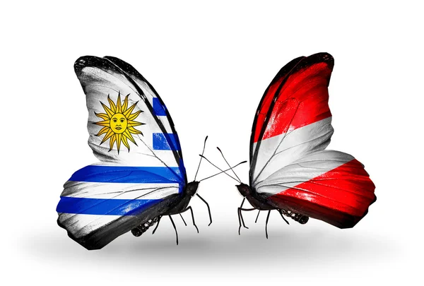 Motyle z Urugwaju i austria flagi — Zdjęcie stockowe