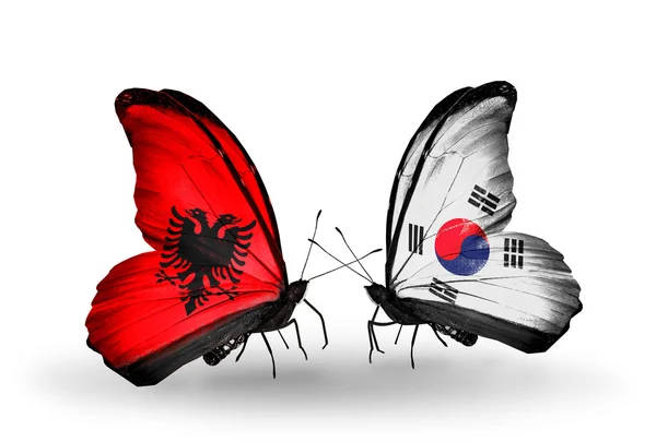 Mariposas con banderas de Albania y Corea del Sur — Foto de Stock