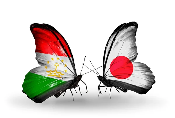 タジキスタンと日本のフラグと蝶 — ストック写真