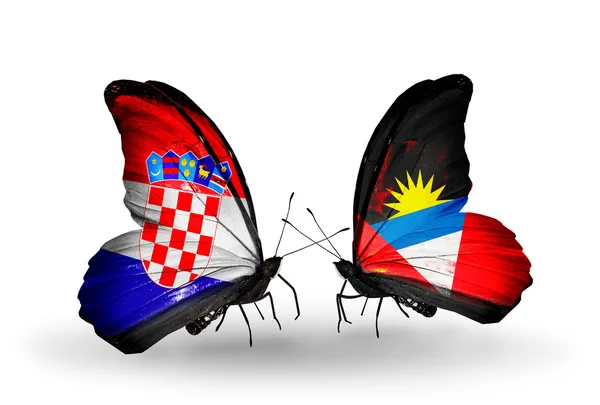 Butterflies with Croatia and Antigua and Barbuda flags — Stock Photo, Image