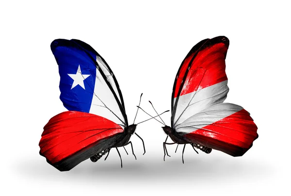 蝴蝶与智利和奥地利国旗 — 图库照片